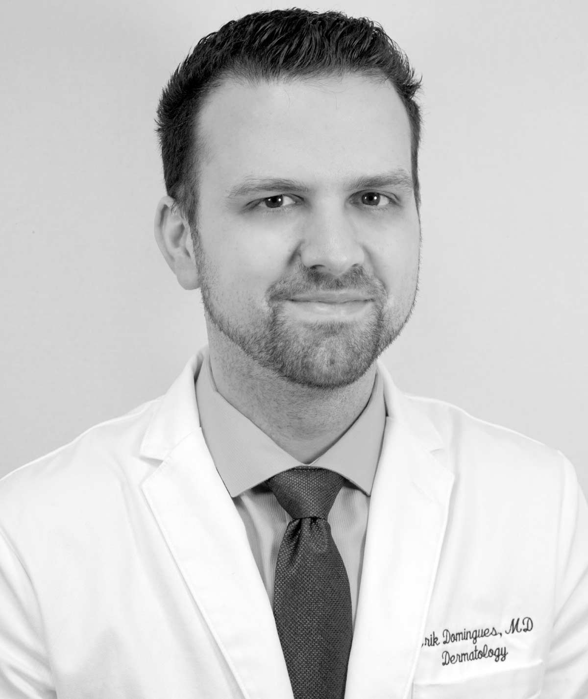 Erik Domingues, MD, FAAD